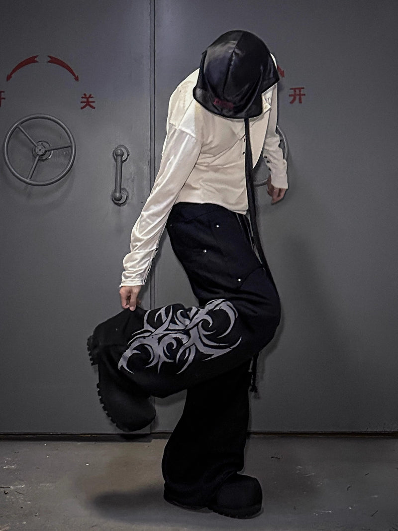 LCE front and back wearing baggy printed sweatpants
